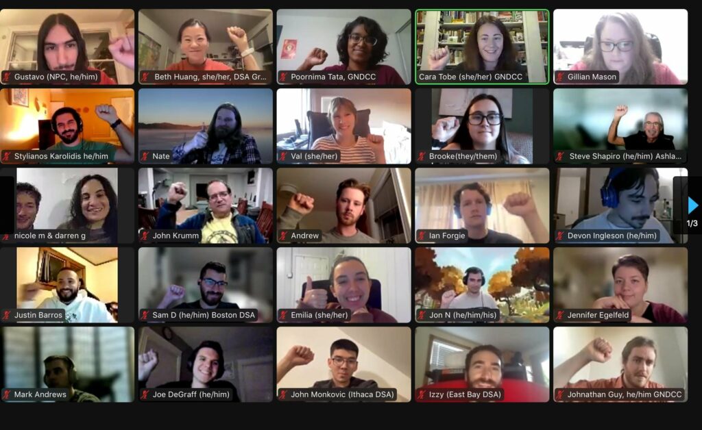 A screencap of a 5 by 5 grid of zoom attendees, participants are raising their fists.